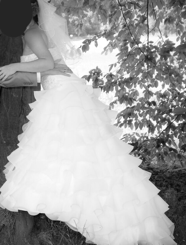 Een prachtige witte trouwjurk Amelia van EM in spaanse style, maat 38